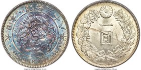 Meiji Yen Year 18 (1885) MS64 PCGS, KM-YA25.2, JNDA 01-10. Colorfully toned by way of flaring intermingled hues of lilac, blue, and green on the obver...
