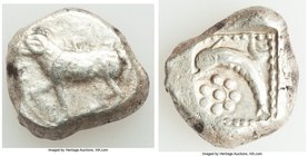 CYPRUS. Uncertain mint. Ca. 5th century BC. AR stater (19mm, 11.08 gm, 8h). VF. Ram walking left / Dolphin leaping left; floral pattern below, all wit...