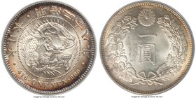 Meiji Yen Year 18 (1885) MS63 PCGS, KM-YA25.2. Luminous cartwheel luster leaps unimpeded across the surfaces of this lustrous Yen, displaying prominen...