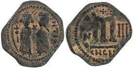 ARAB-BYZANTINE: Two Figure Phocas type, ca. 610s-640s, AE follis (9.04g), year "3", A-3500, based on the Antioch type MIB83, Gr-152, with mint name bl...