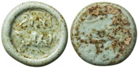 FATIMID: al-Zafir, 1149-1154, glass jeton/weight (2.95g), A-740, FGJ-412, short text al-imam / al-zafir, no border; greenish white, opaque, EF, R. 
...