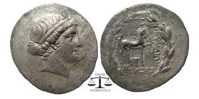 Kyme AR Tetradrachm, c. 165-140 BC
Obv. Head of the Amazon Kyme to right, wearing taenia.
Rev. Horse prancing right; one-handled cup below raised fore...
