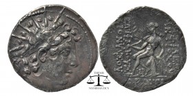 SELEUCID KINGDOM. Antiochus VI Dionysos (144-142 BC). AR drachm
Diademed, radiate head of Antiochus VI right,
Apollo seated left on omphalus, testin...