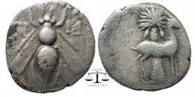 Ionia. Ephesos . Uncertain magistrate circa 202-150 BC. Drachm AR
Obv : Bee
Rev: stag standing right; palm tree with fruit in background
BMC -; SNG...