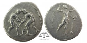 Pamphylia, Aspendos AR Stater. Circa 325-250 BC. Two wrestlers grappling; K between / Slinger in throwing stance right; to right, triskeles above club...