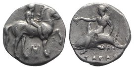 Southern Apulia, Tarentum, c. 365-355 BC. AR Nomos (20mm, 7.79g, 6h). Nude youth on horseback r.; kantharos below. R/ Phalanthos on dolphin l., holdin...