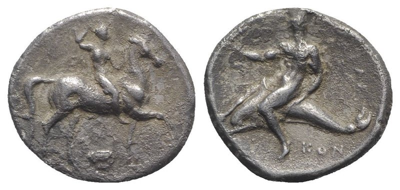 Southern Apulia, Tarentum, c. 302 BC. AR Nomos (23mm, 7.33g, 6h). Nude youth, cr...