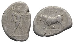 Northern Lucania, Poseidonia, c. 420-410 BC. AR Stater (21mm, 7.52g, 3h). Poseidon advancing r., wielding trident. R/ Bull standing l. on pelleted gro...