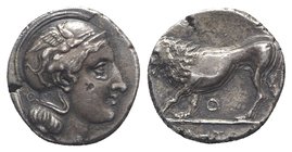 Northern Lucania, Velia, c. 340-334 BC. AR Didrachm (17mm, 6.17g, 5h). Head of Athena r., wearing Attic helmet decorated with a griffin; Θ behind. R/ ...