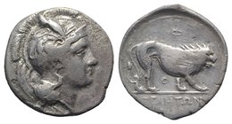 Northern Lucania, Velia, c. 340-334 BC. AR Didrachm (23mm, 7.18g, 2h). Head of Athena r., wearing crested Attic helmet decorated with griffin. R/ Lion...