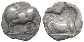Southern Lucania, Sybaris, c. 550-510 BC. AR Stater (28mm, 7.24g, 12h). Bull standing l. on dotted exergual line, looking back. R/ Incuse bull standin...