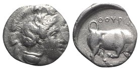 Southern Lucania, Thourioi, c. 400-350 BC. AR Stater (21mm, 7.36g, 11h). Helmeted head of Athena r., helmet decorated with Skylla pointing and holding...