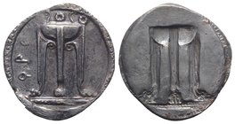Bruttium, Kroton, c. 530-500 BC. AR Stater (31mm, 8.13g, 12h). Tripod, legs terminating in lion's feet, serpents rising from bowl. R/ Incuse tripod as...