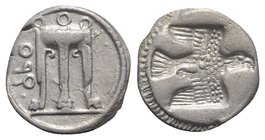 Bruttium, Kroton, c. 480-430 BC. AR Stater (18mm, 7.84g, 9h). Tripod, legs terminating in lion's feet. R/ Incuse eagle flying r. HNItaly 2108; SNG ANS...