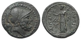Bruttium, Petelia, late 3rd century BC. Æ (11mm, 1.66g, 11h). Helmeted head of Ares r. R/ Nike standing l., holding wreath; two monograms to inner l. ...