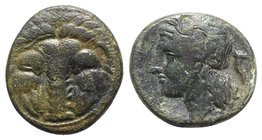 Bruttium, Rhegion, c. 351-280 BC. Æ (20mm, 6.32g, 1). Facing lion’s scalp. R/ Laureate head of Apollo l.; amphora behind. HNItaly 2534b. Green patina,...