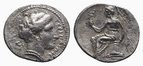 Bruttium, Terina, c. 300 BC. AR Drachm (15mm, 2.13g, 6h). Head of nymph r.; triskeles behind. R/ Nike seated l. on plinth, holding kerykeion. Holloway...
