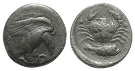Sicily, Akragas, c. 425-406 BC. Æ Hexas (18mm, 6.90g, 5h). Eagle standing r. on serpent, head lowered, wings spread. R/ Crab; below, grouper r.; two p...