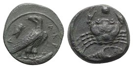 Sicily, Akragas, c. 425-406 BC. Æ Onkia (16mm, 3.97g, 9h). Eagle standing r., head l., on fish; to l., cicada. R/ Crab; conch-shell below, pellet abov...