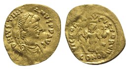 Justinian I (527-565). AV Tremissis (14mm, 1.06g, 6h). Constantinople. Diademed, draped and cuirassed bust r. R/ Victory advancing r., head l., holdin...