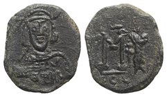 Constantine IV (668-685). Æ 40 Nummi (20mm, 4.39g, 6h). Syracuse, 674-681. Helmeted and cuirassed bust facing slightly r., wearing short beard, holdin...