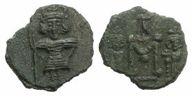 Constantine IV (668-685). Æ 40 Nummi (19mm, 3.39g, 6h). Syracuse, 672-677. Constantine, helmeted and cuirassed, standing facing, holding spear. R/ Lar...