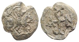 Byzantine Pb Seal, c. 7th-12th century (20mm, 6.93g, 12h). St. George on horseback r. R/ Cruciform monogram. VF