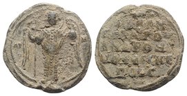 Byzantine Pb Seal, c. 7th-12th century (27mm, 10.00g, 12h). St. Michael the Archangel standing facing, winged, holding sceptre and globe. R/ Legend in...