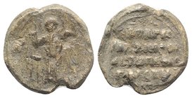 Byzantine Pb Seal, c. 7th-12th century (22mm, 7.96g, 12h). St. Michael the Archangel standing facing, winged, holding sceptre and globe. R/ Legend in ...
