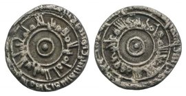 Islamic, Fatimids. al-Mu'izz li-Din Allah (AH 341-365). AR 1/4 Dirham (11mm, 0.46g). Arab legend around two cirles and central pellet. R/ Arab legend ...