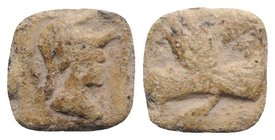 Roman PB Tessera, c. 1st century BC - 1st century AD (14mm, 3.52g, 3h). Helmeted bust of Minerva(?) r. R/ Eagle flying l. VF
