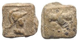 Roman PB Tessera, c. 1st century BC - 1st century AD (14mm, 3.24g, 3h). Helmeted bust of Minerva(?) r. R/ Eagle flying l. VF