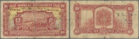 Bermuda: 10 Shillings 1927 P. 4 portrait KGV, very rare note even in this used condition with several pen writings on front, strong center fold, cente...