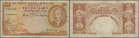 British Caribbean Territories: 10 Dollars 1950 P. 4, more rare issue, used with several folds and stain in paper, a few rusty dots at upper border, no...