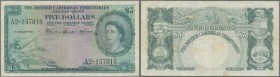 British Caribbean Territories: 5 Dollars 1953, P.9a in well worn condition with a number of folds and stains. Condition: F-