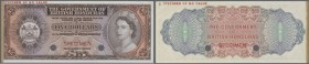 British Honduras: 5 Dollars 1953-73 color trial Specimen, lilac instead of red, P.30cts, tiny dint at upper right corner, traces of glue at left borde...