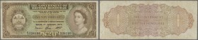 British Honduras: 20 Dollars 1973 P. 32c, several vertical folds and handling in paper, light stained paper, no holes or tears, still original colors,...