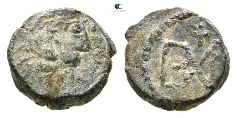 The Ostrogoths. Ticinum (?) AD 541-552. Pseudo-Imperial Coinage.
Nummus Æ

9 ...