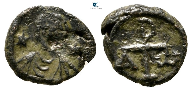 Justinian I AD 527-565. Carthage
Nummus Æ

11 mm., 0,79 g.



very fine