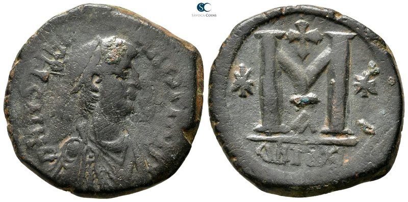 Justinian I AD 527-565. Theoupolis (Antioch)
Follis Æ

31 mm., 16,18 g.


...