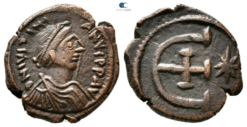 Justinian I AD 527-565. Theoupolis (Antioch)
Pentanummium Æ

17 mm., 2,22 g....