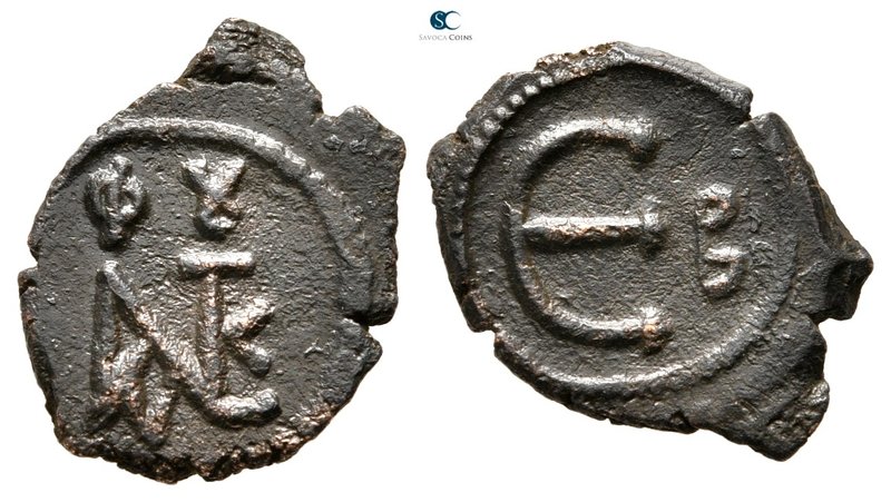 Justin II AD 565-578. Constantinople
Pentanummium Æ

16 mm., 1,32 g.



v...