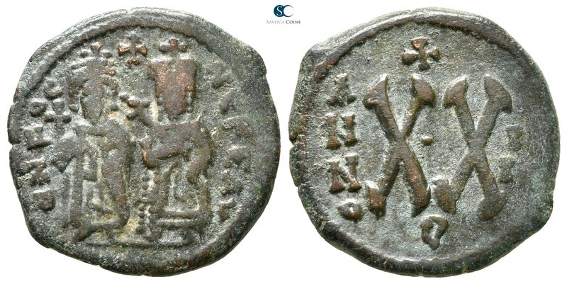 Phocas, with Leontia AD 602-610. Theoupolis (Antioch)
Half follis Æ

22 mm., ...