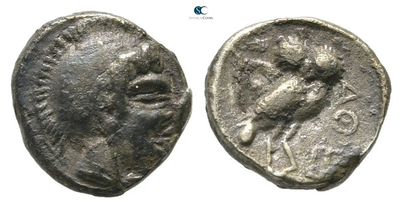 Attica. Athens circa 400-300 BC. Uncertain eastern imitation
Obol AR

9 mm., ...