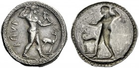 The M.L. Collection of Coins of Magna Graecia and Sicily   Bruttium, Caulonia  Nomos circa 525-500, AR 8.53 g. KAVΛ Apollo, diademed, walking r., hol...