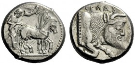  The M.L. Collection of Coins of Magna Graecia and Sicily   Gela  Tetradrachm circa 480-470, AR 17.15 g. Slow quadriga driven r. by charioteer holding...