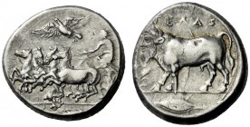 The M.L. Collection of Coins of Magna Graecia and Sicily   Gela  Tetradrachm circa 415-405, AR 17.13 g. Fast quadriga driven l. by charioteer holding...