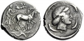  The M.L. Collection of Coins of Magna Graecia and Sicily   Syracuse  Tetradrachm circa 450, AR 17.37 g. Slow quadriga driven r. by bearded charioteer...