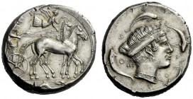  The M.L. Collection of Coins of Magna Graecia and Sicily   Syracuse  Tetradrachm circa 450-440, AR 17.36 g. Slow quadriga driven r. by bearded chario...
