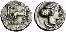  The M.L. Collection of Coins of Magna Graecia and Sicily   Syracuse  Tetradrachm circa 420-415, AR 17.70 g. Slow quadriga driven r. by charioteer, ho...